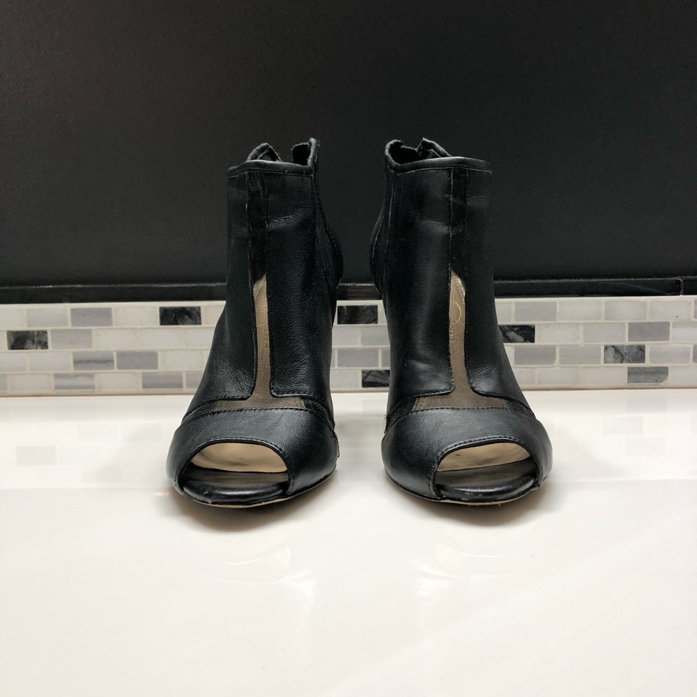 Jessica Simpson stiletto peep toe booties.